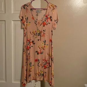 Light pink dress with attached necklace.